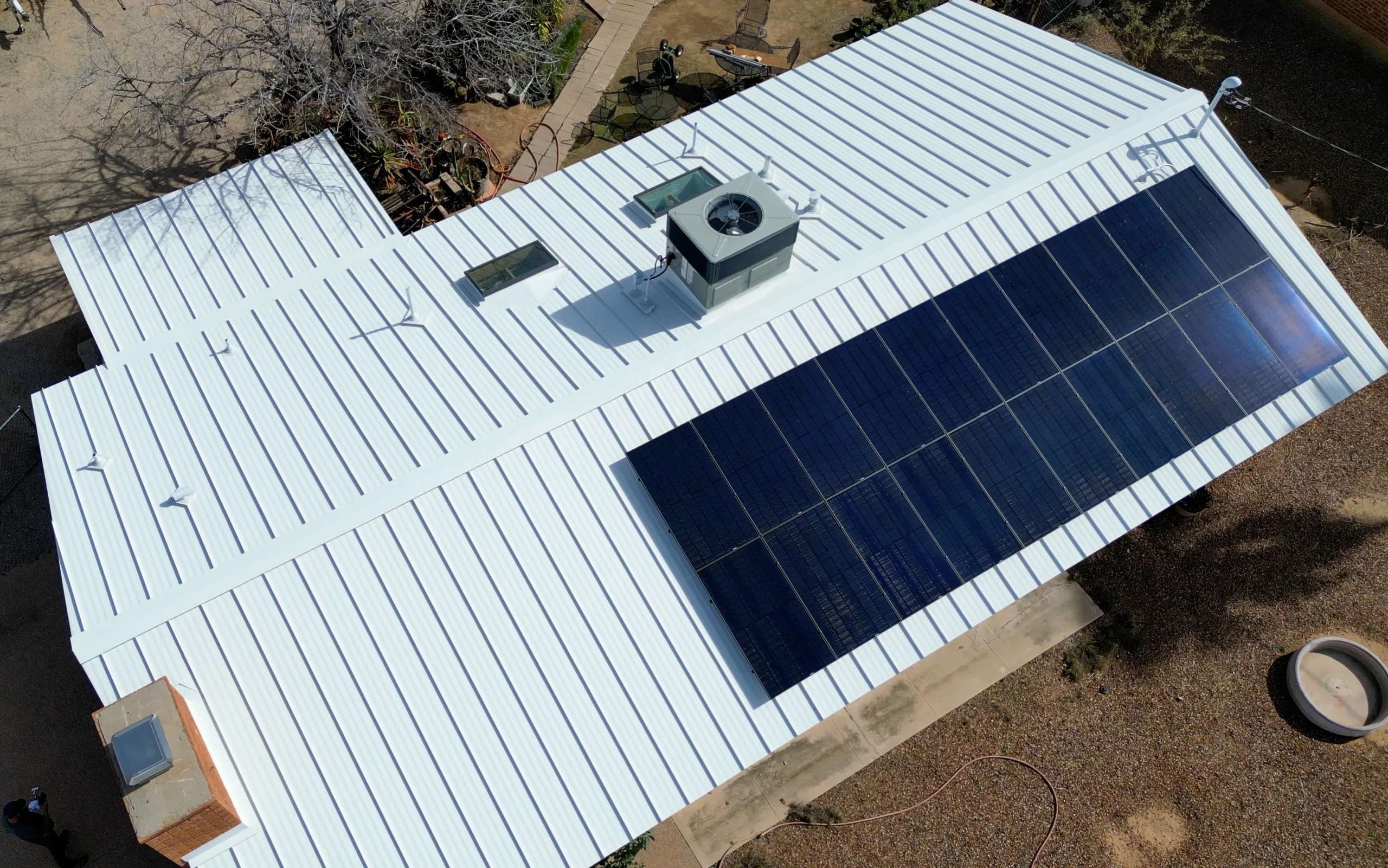 Solar Panel and Standing Seam Metal Roof Combo by AZ Roofer