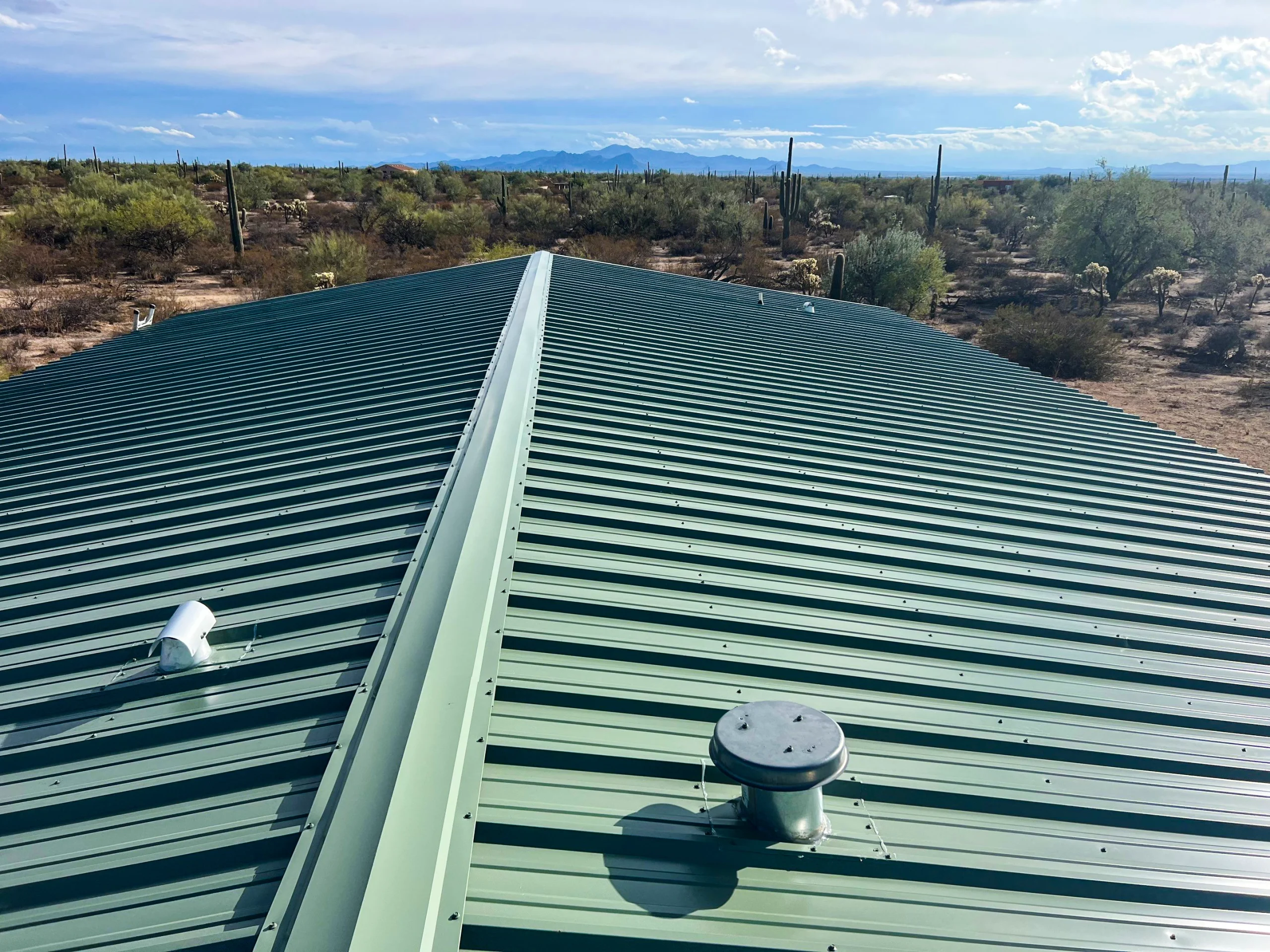 Exposed-fastener-roof-metal-roof-reimagine-roofing-scaled-1