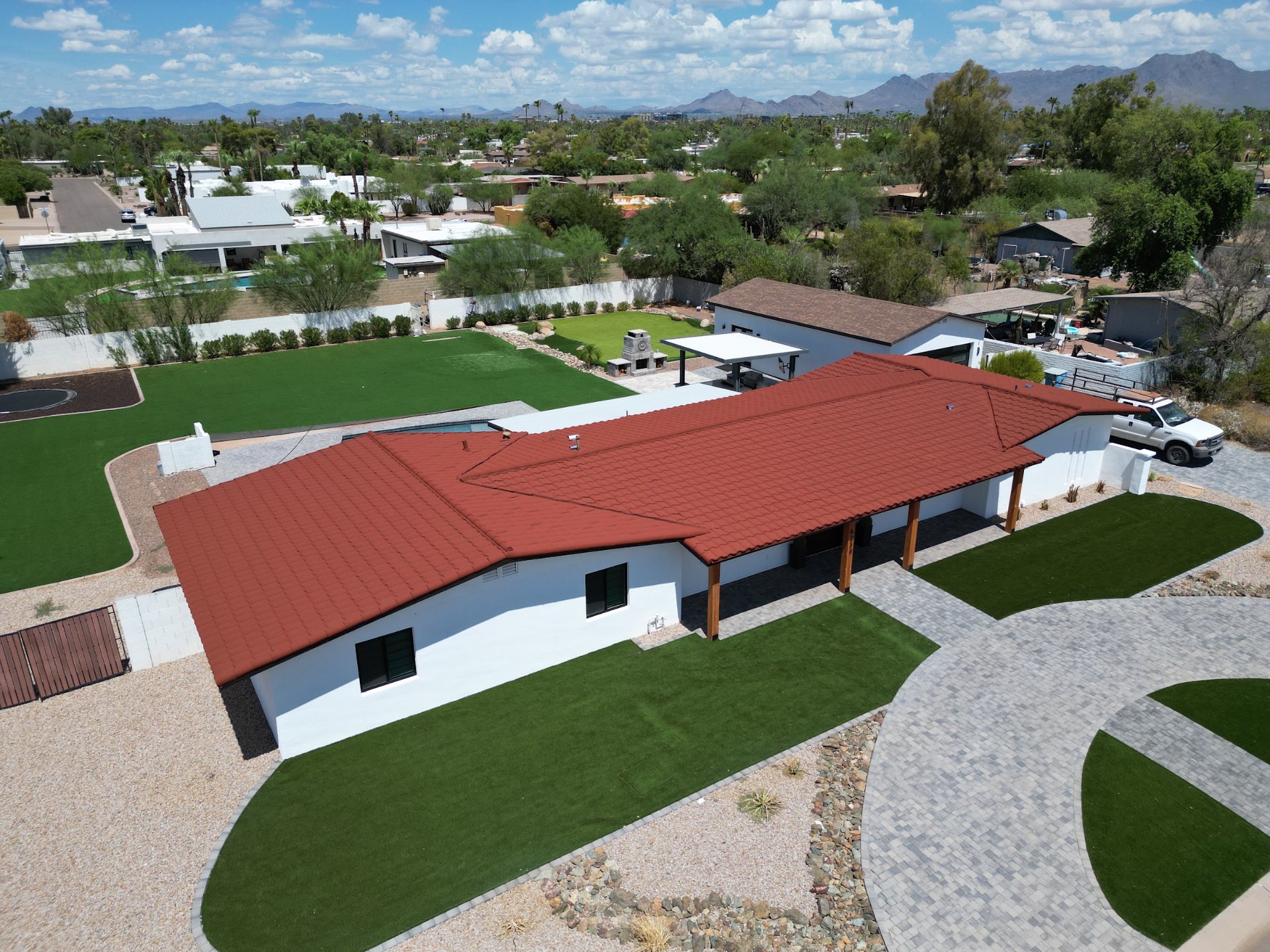 Arizona ranch home with a new red roof and mountain views